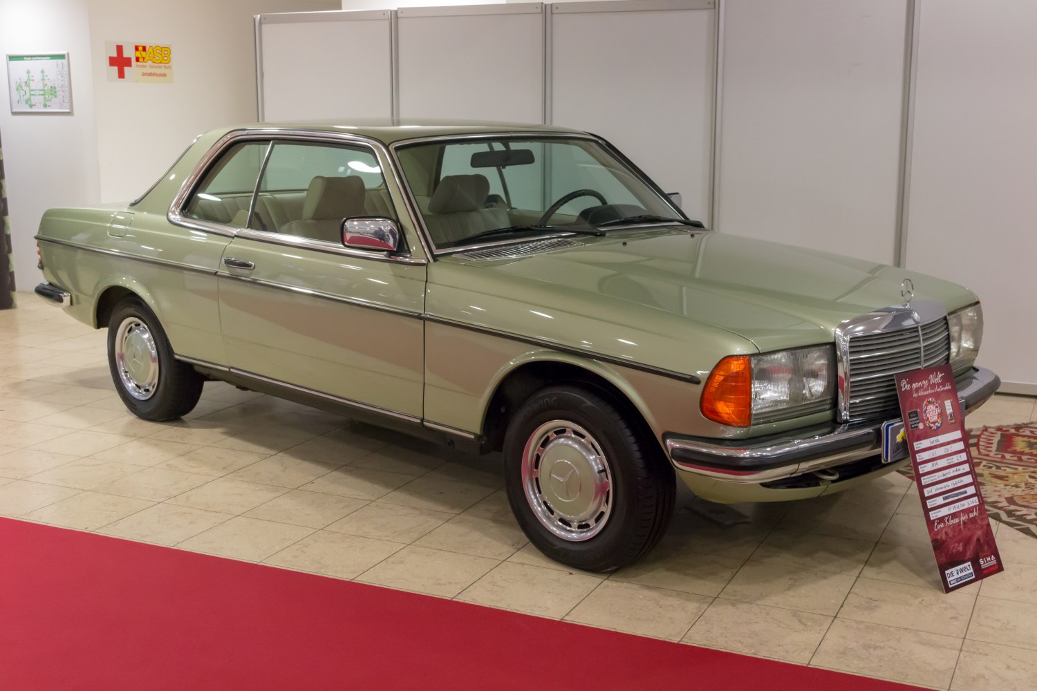 Classic two-door coupe with chrome accents and vintage styling