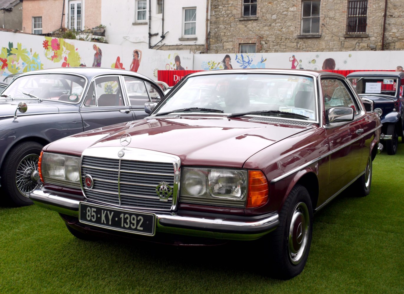 Front grille and rectangular headlights of a classic coupe