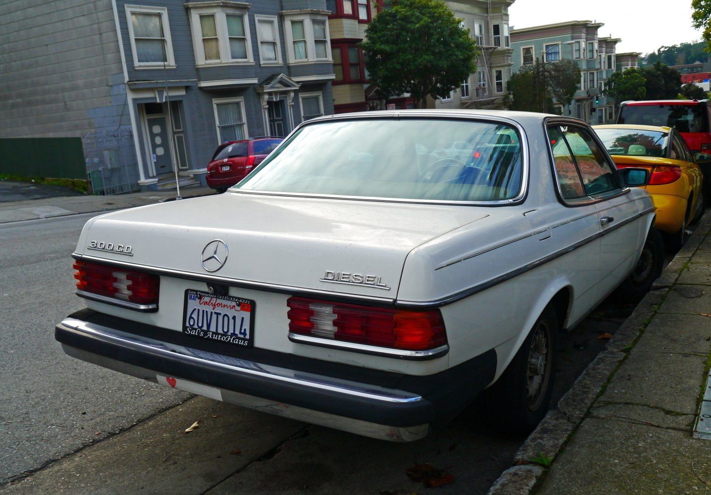 Classic 1970s Mercedes rear with distinct taillights and diesel badging