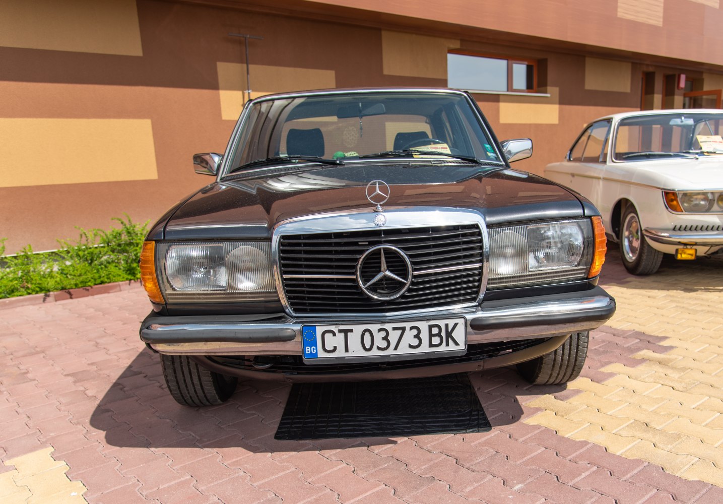 Chrome grille and dual rectangular headlights with hood emblem