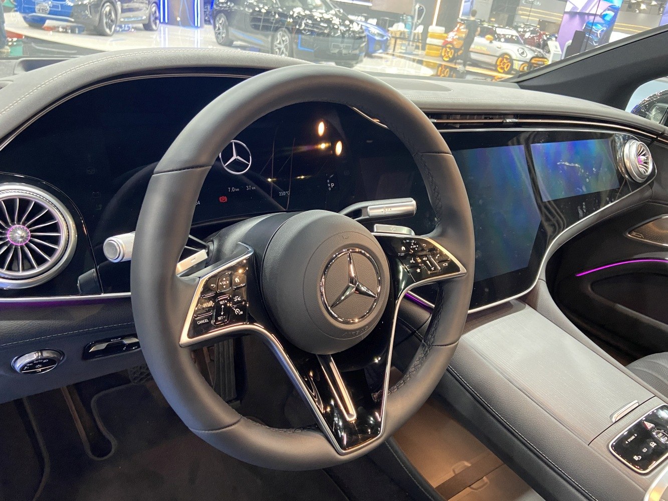 Digital dashboard and multifunction steering wheel in luxury electric vehicle interior