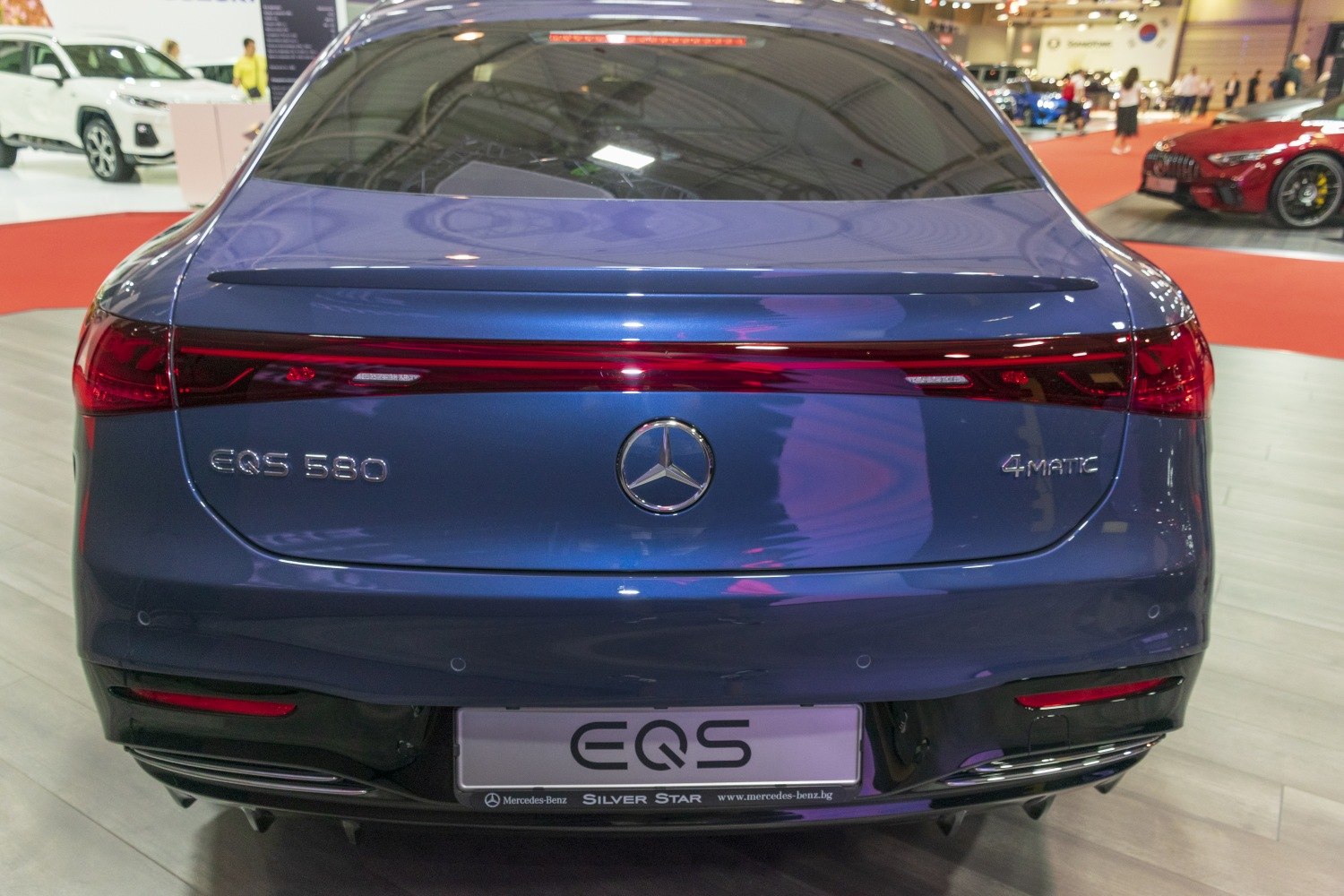 Sleek rear design with continuous tail light and Mercedes emblem