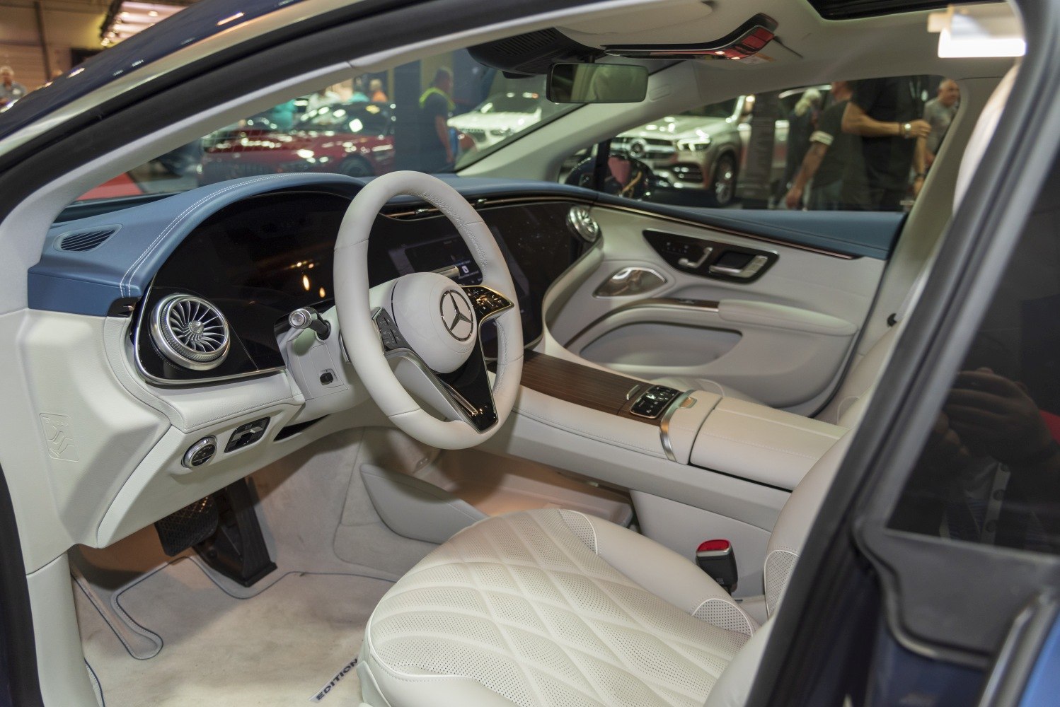Luxury car interior with digital dashboard and leather seats