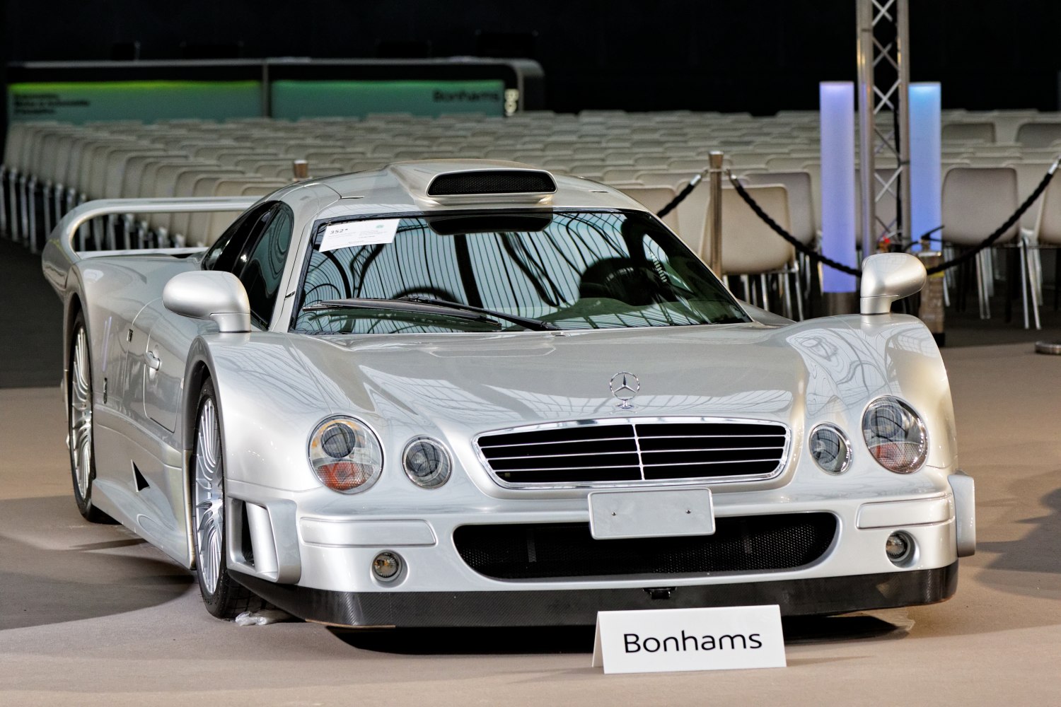 Silver supercar with distinctive front grille and aerodynamic shape