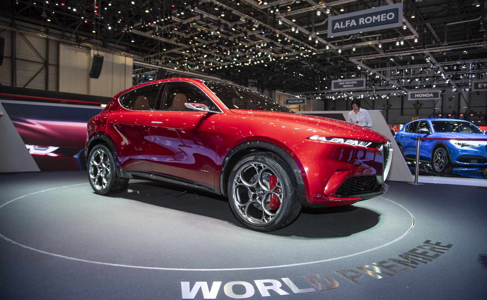 Sleek aerodynamic SUV with unique multi-spoke alloy wheels.