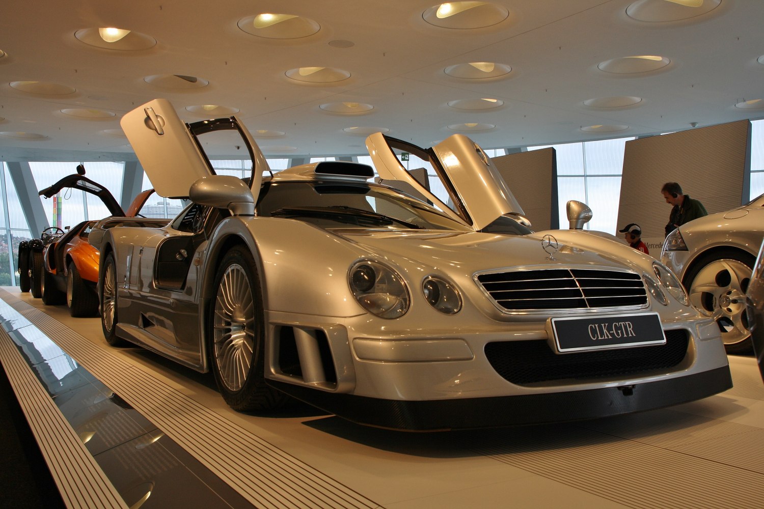 Distinctive gullwing doors and aerodynamic sports coupe body