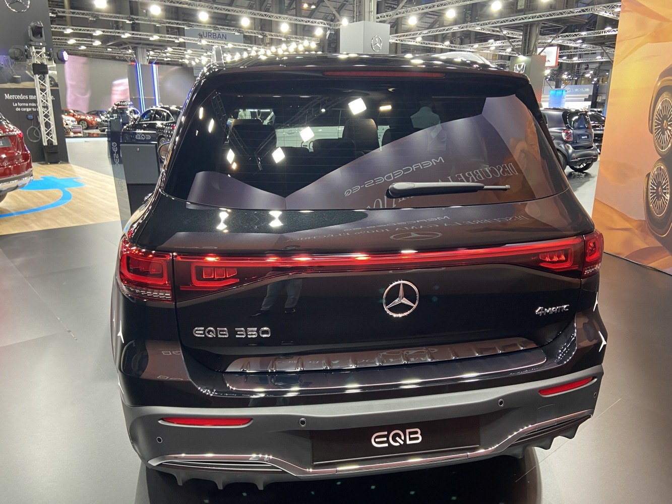 Rear view of electric SUV with sleek taillight design and 4MATIC badge