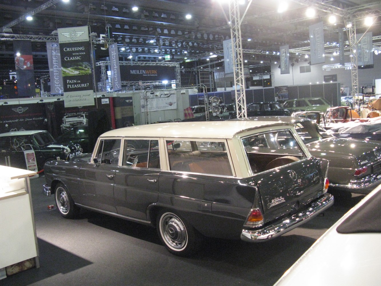 Classic 1960s station wagon rear view in indoor exhibition