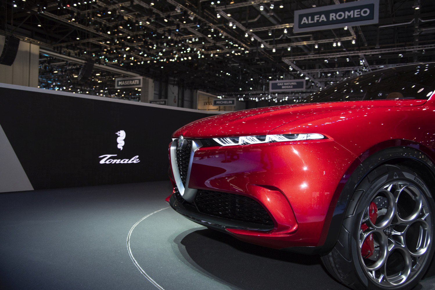 Front view with sleek LED headlights and unique alloy wheel design