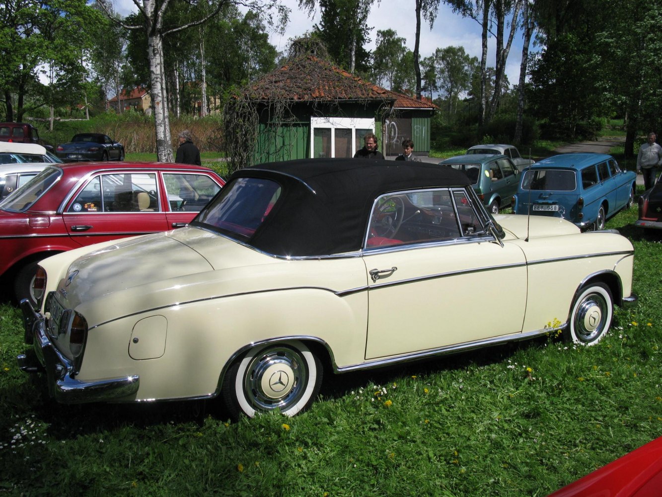 Convertible with black soft top and chrome detailing