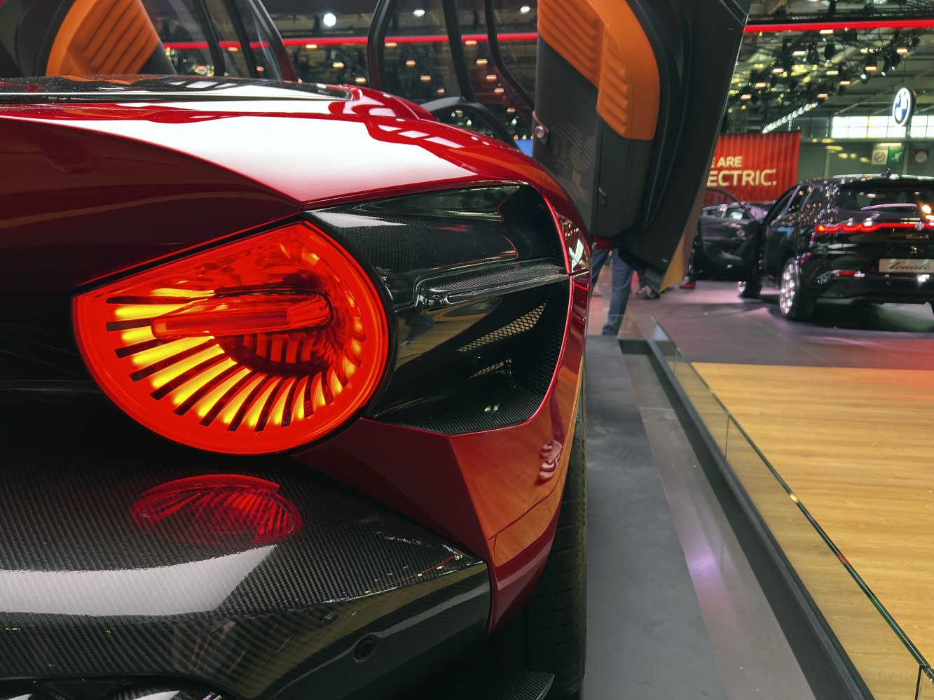 Rear taillight and carbon fiber side panel with butterfly door open