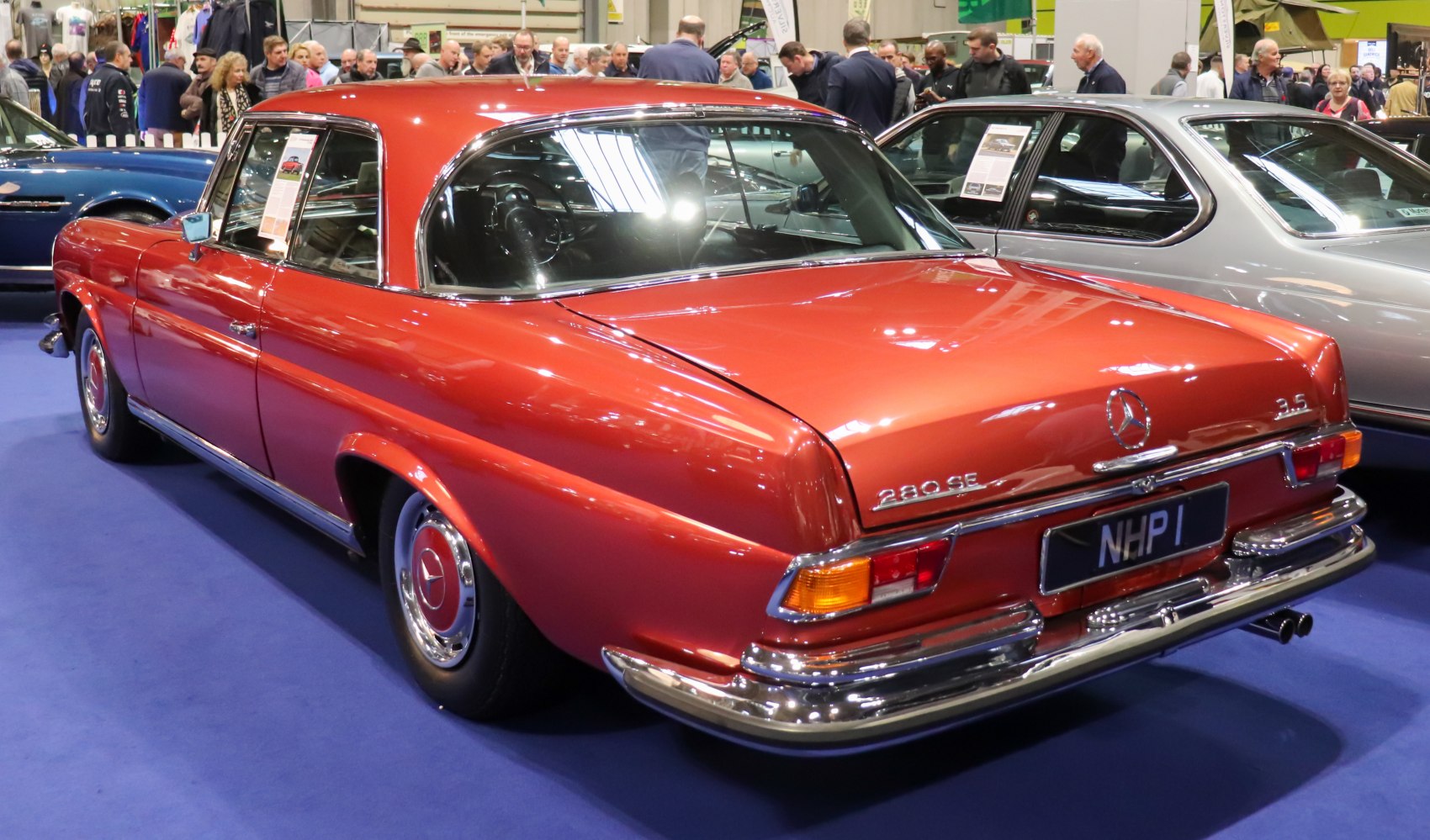 Rear view of a vintage Mercedes-Benz 280 SE 3.5 with chrome detailing and distinctive 1960s design