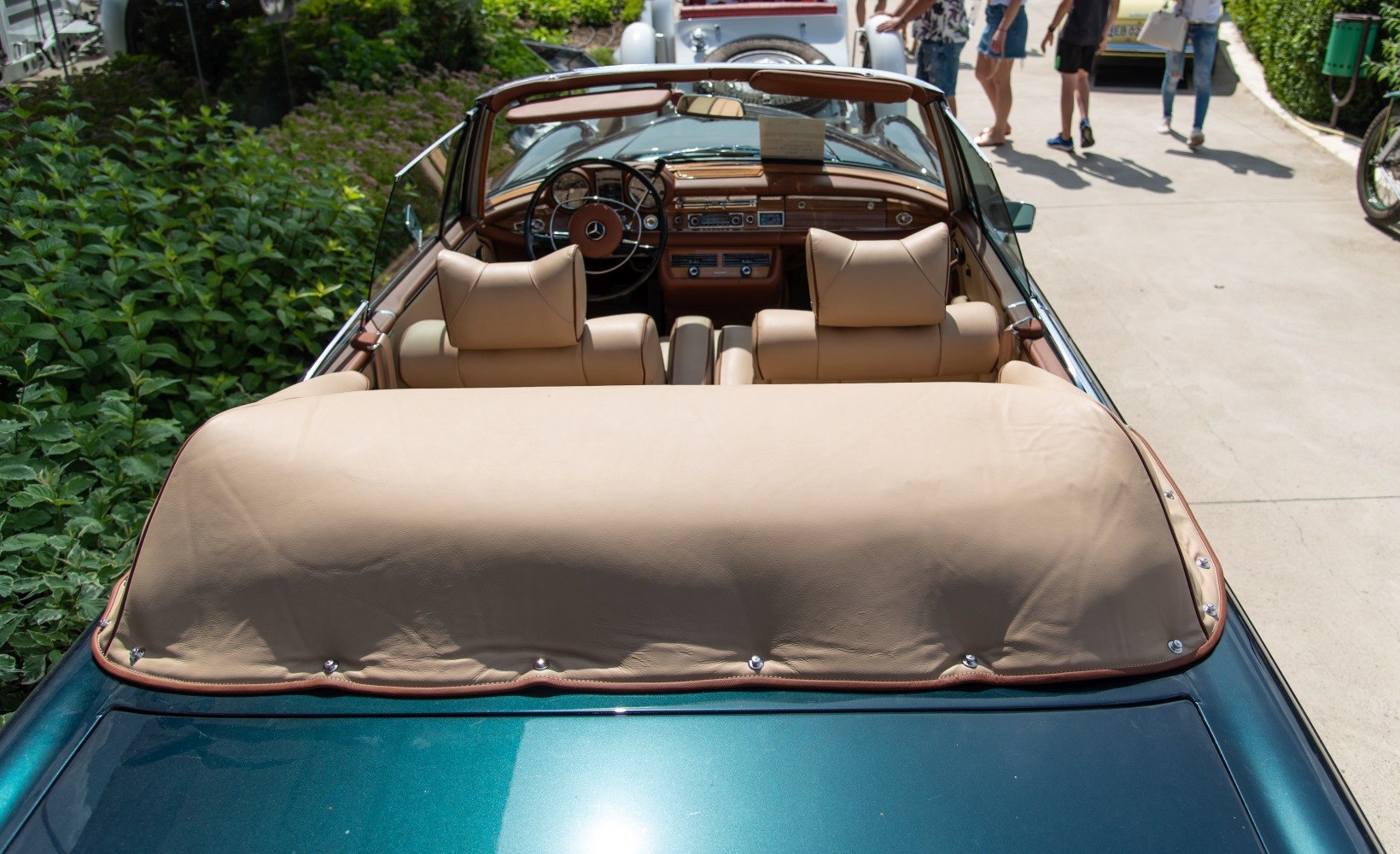 Vintage convertible dashboard and leather seats close-up