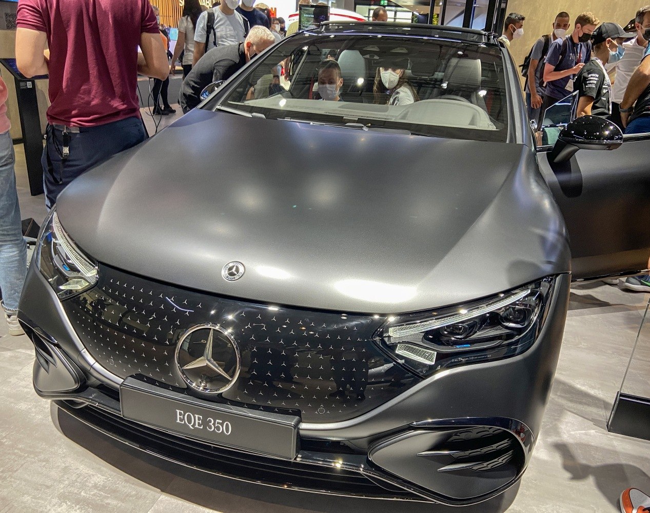 Front view showing LED headlights and patterned grille design.
