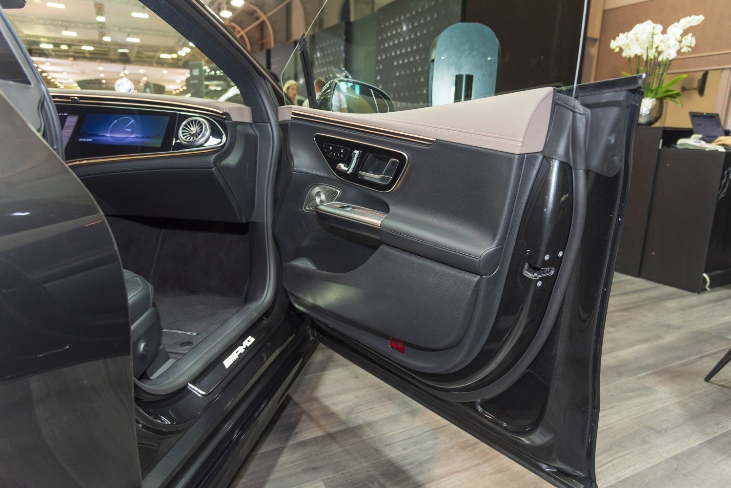 Premium door panel with advanced controls and luxurious materials
