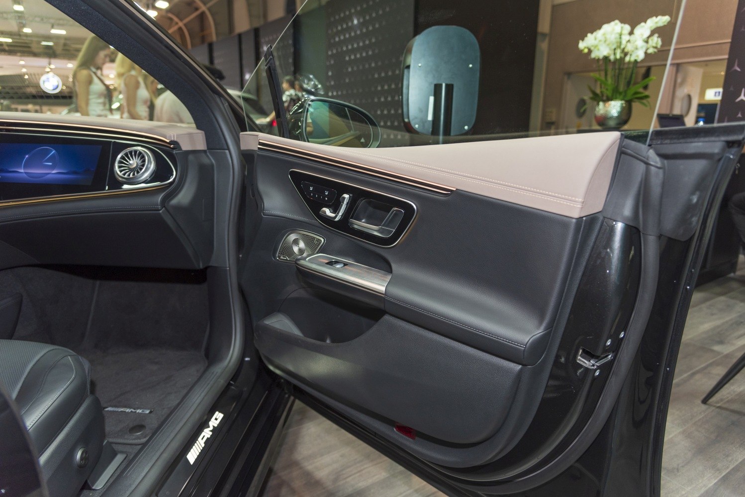Luxury interior door panel with leather and advanced controls
