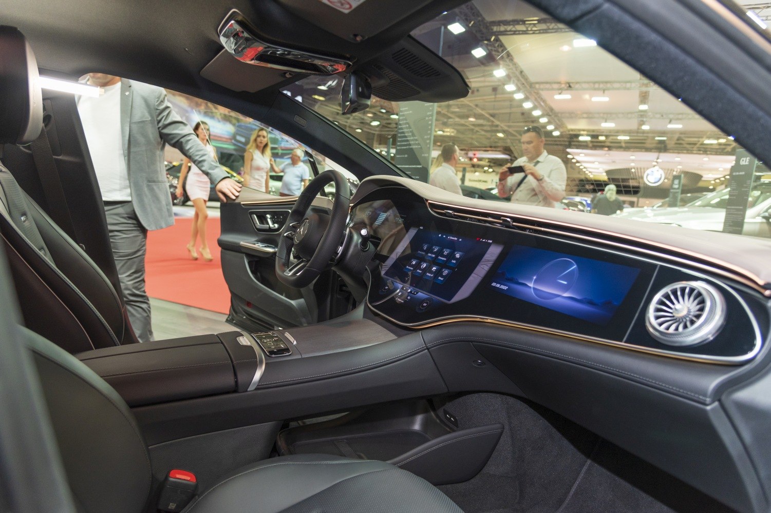 Luxury car interior with dual digital displays and modern dashboard