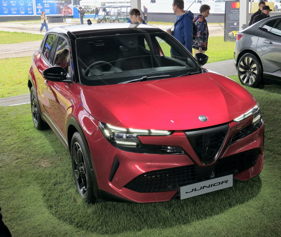 Red crossover with sleek front design and modern LED headlights.