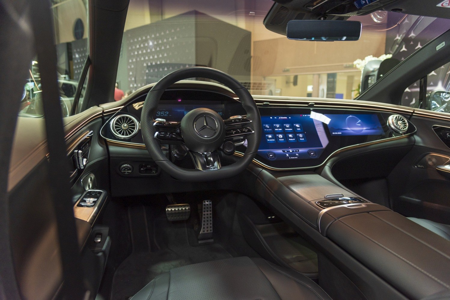 Digital dashboard and multifunction steering wheel in luxury electric vehicle interior