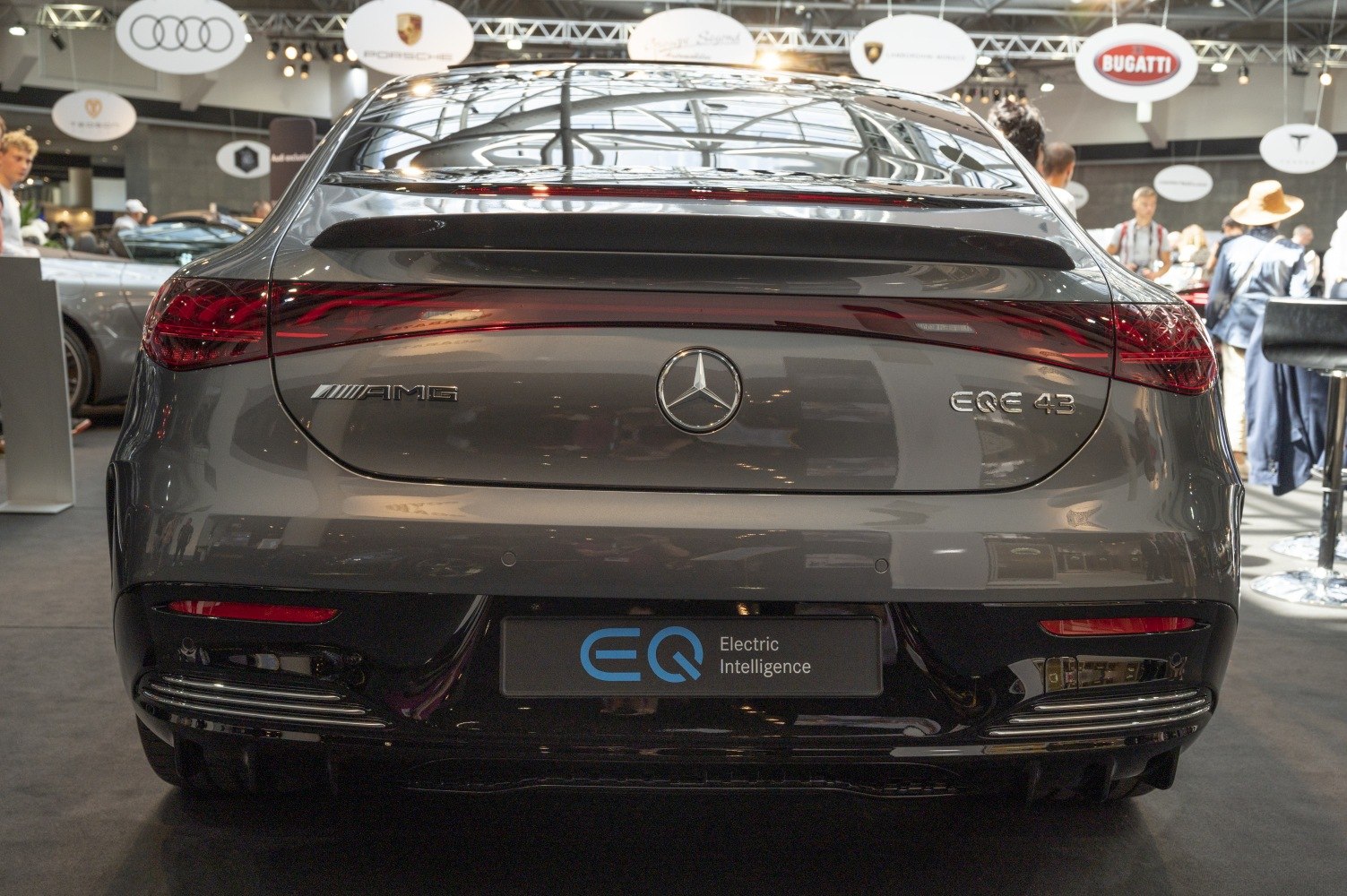 Rear view of AMG electric luxury sedan with LED tail lights