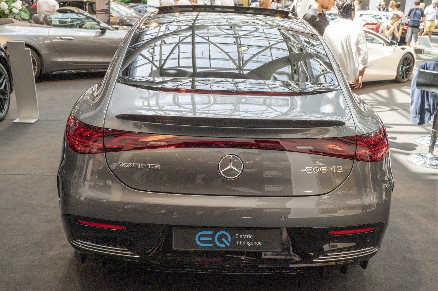 Rear view of electric luxury sedan with AMG and EQE 43 badges