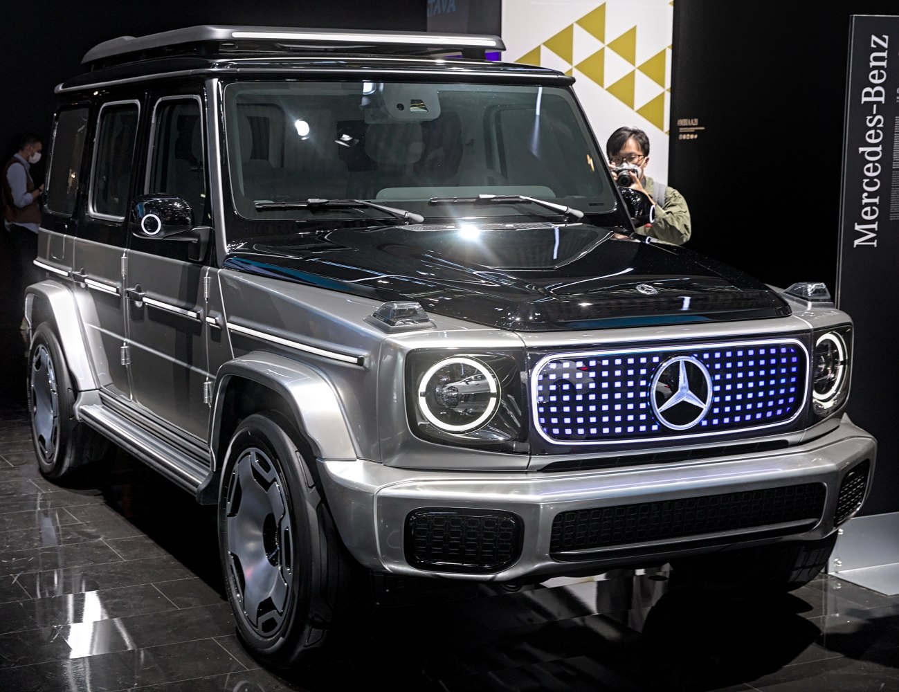 Front view of SUV with LED grille and round headlights