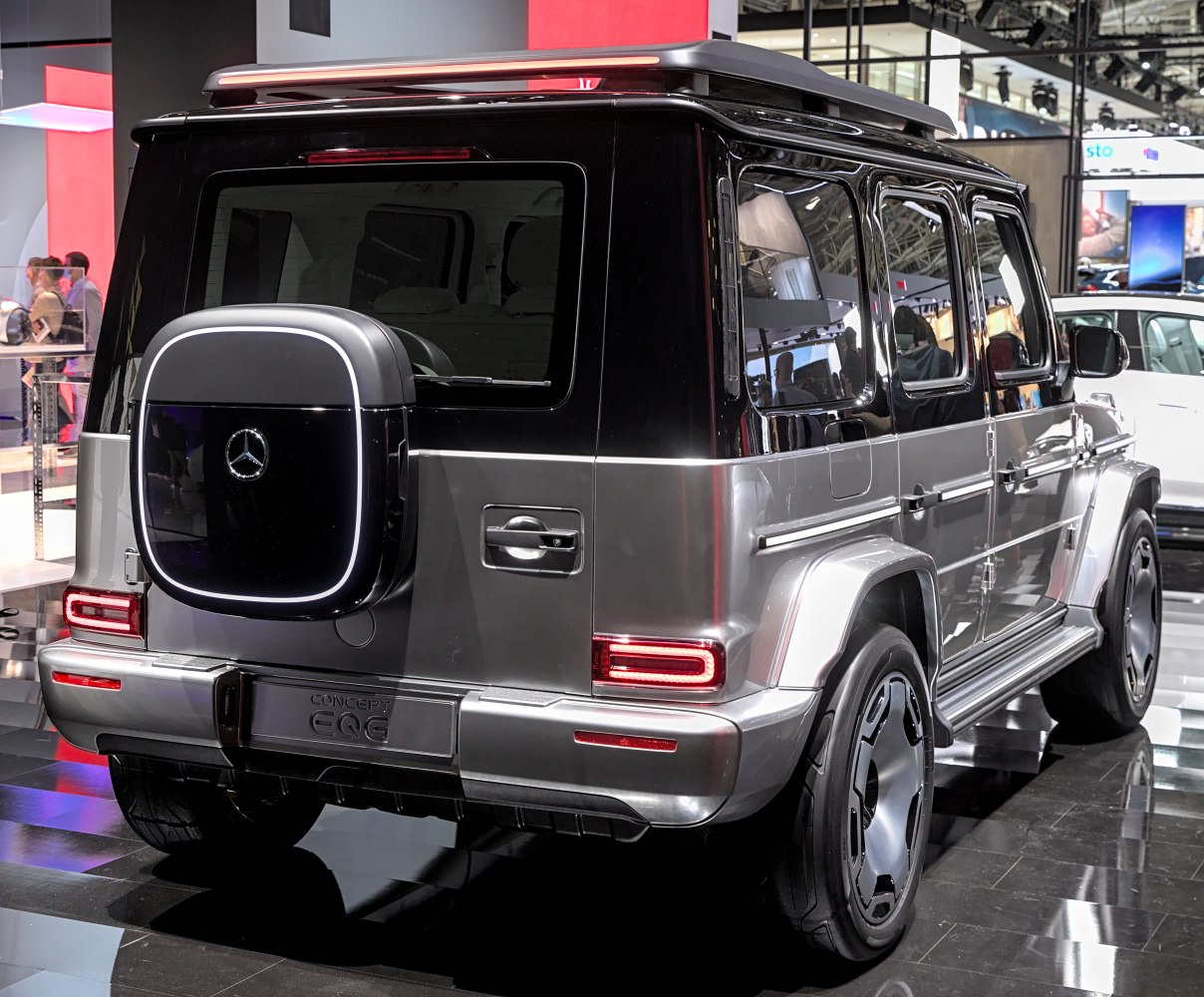 Rear design with illuminated spare tire cover and modern SUV tail lights.