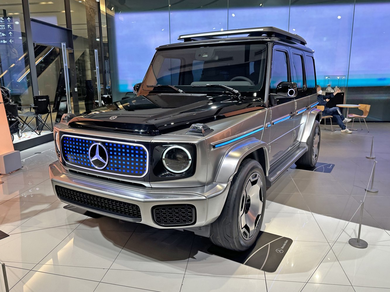 Electric SUV with illuminated grille and modern angular design