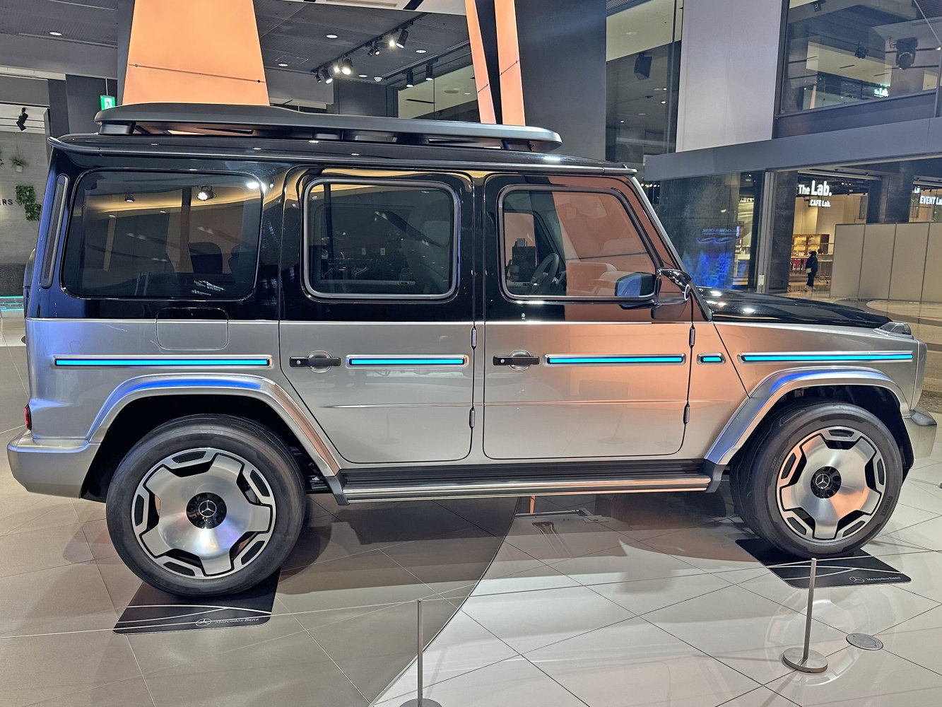 Side profile of an electric SUV with LED light strips and unique alloy wheels