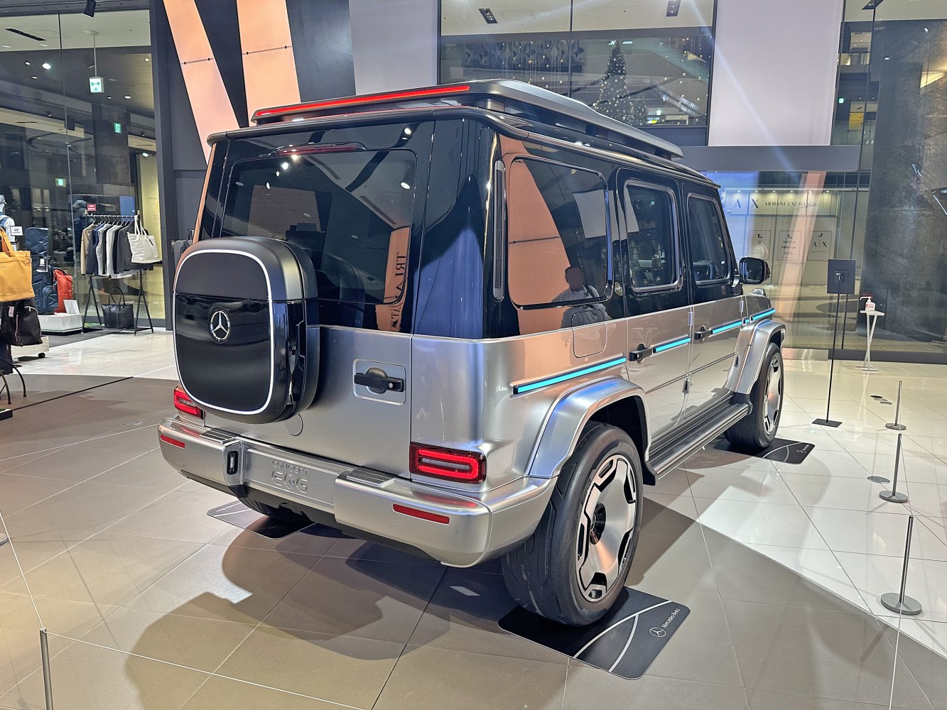 Rear and side view with LED strip lighting and modern wheel design