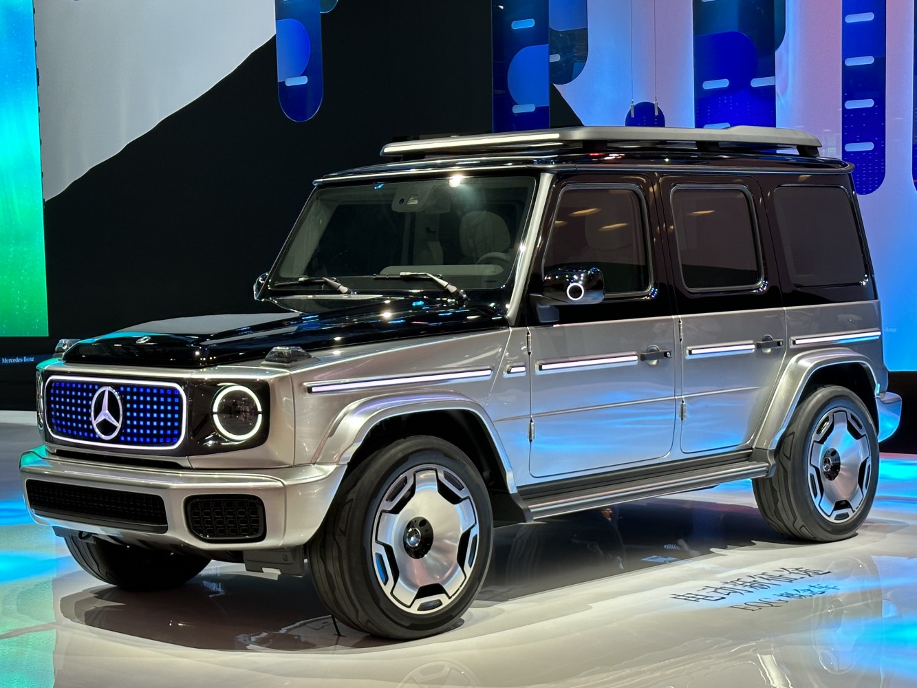 Electric SUV with LED illuminated grille and futuristic design