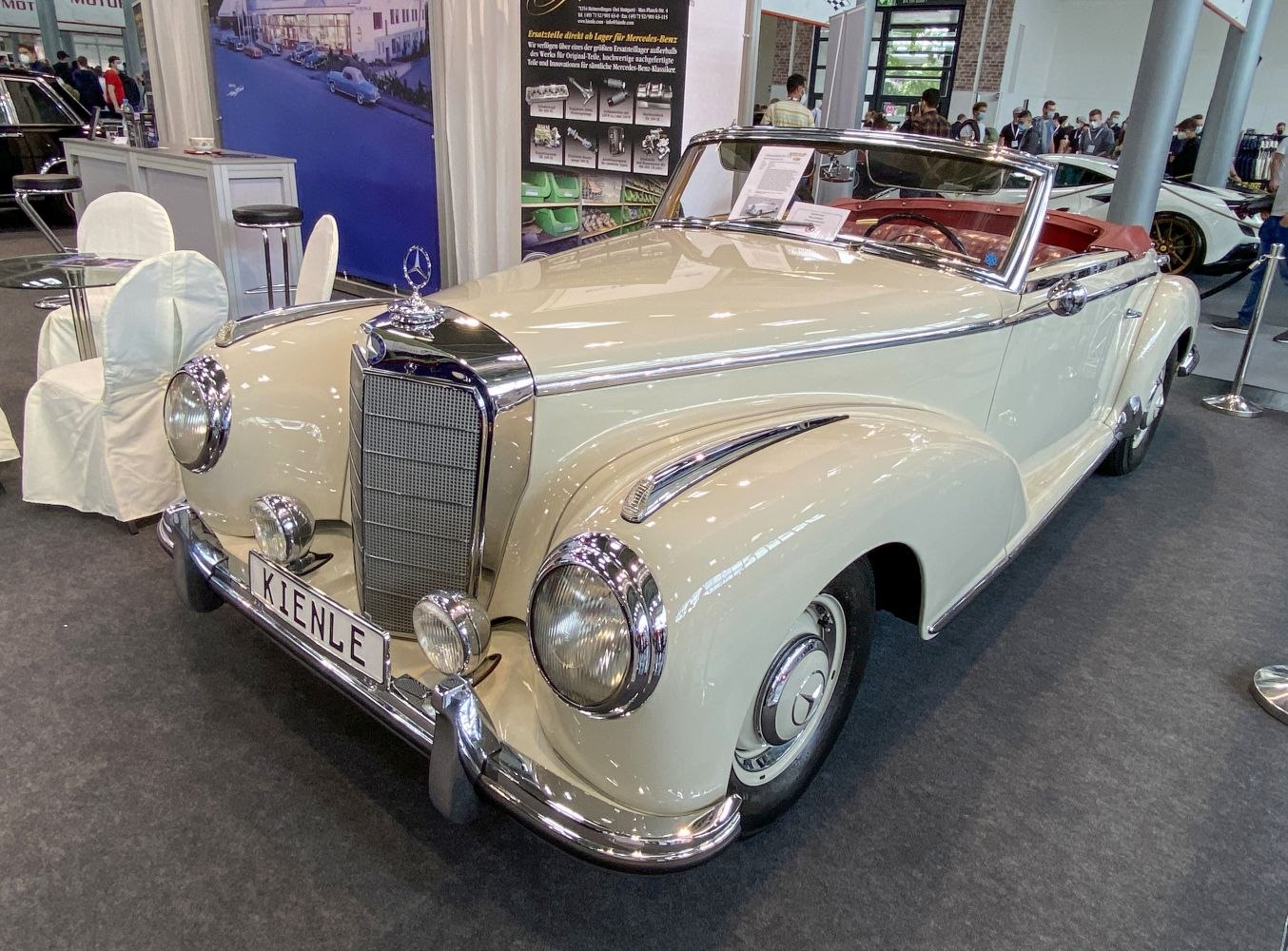 Vintage convertible with chrome grille and round headlights