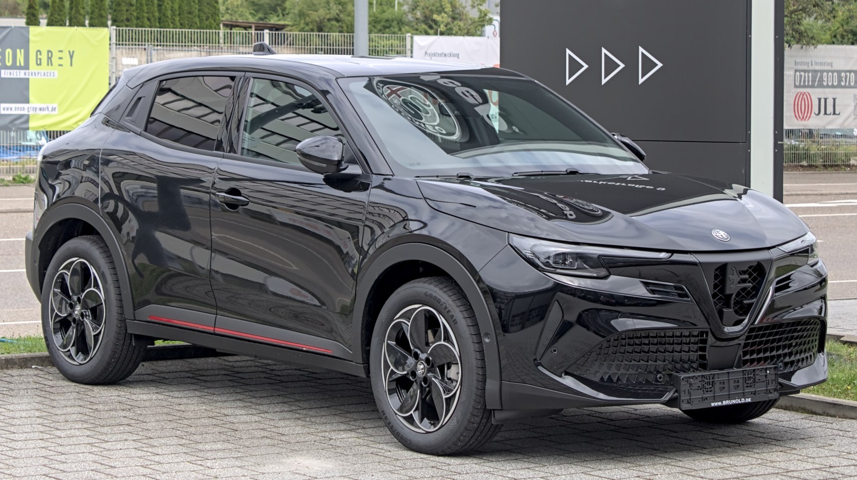 Compact SUV with sporty front grille and LED headlights.
