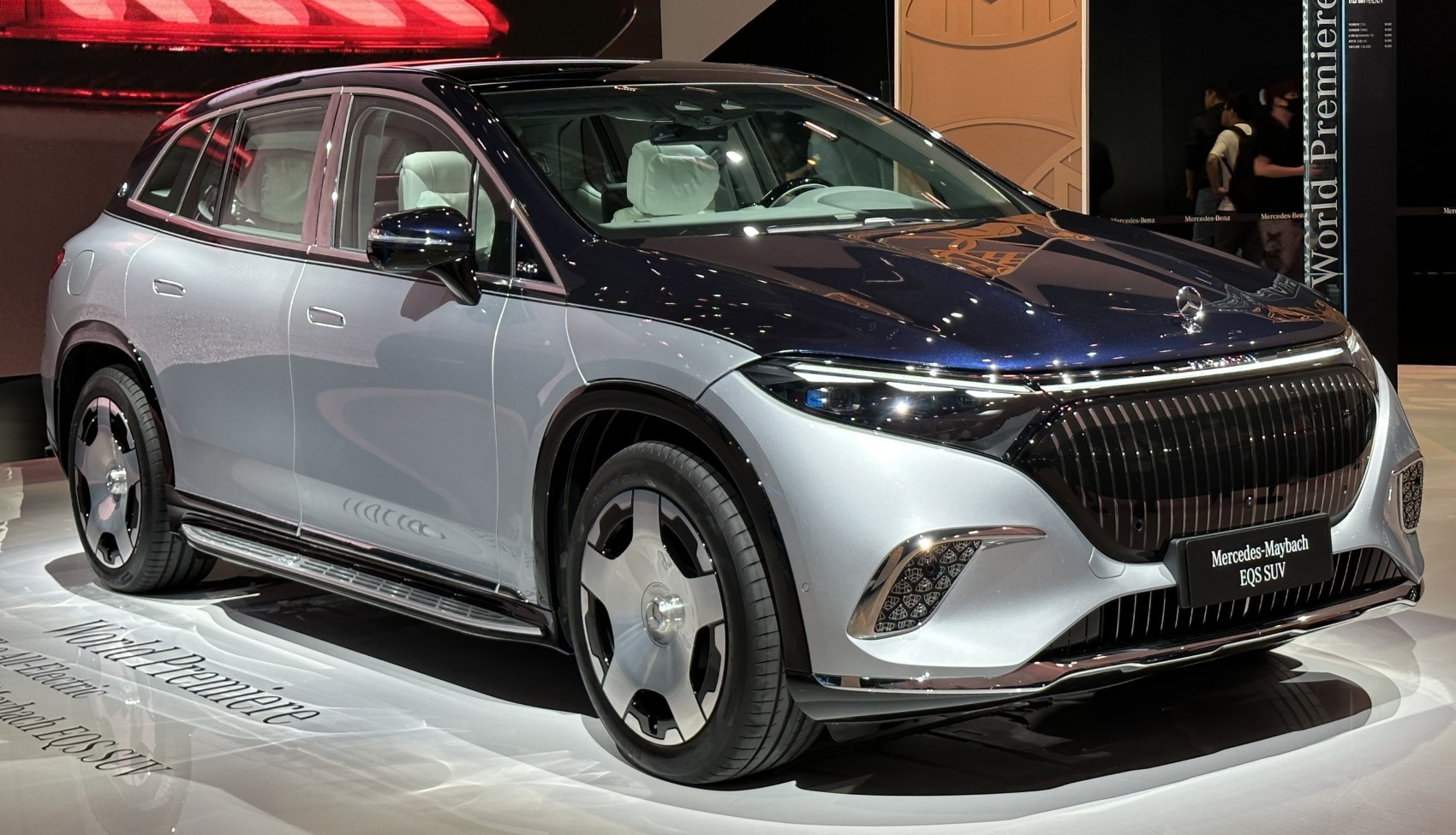 Front side view featuring futuristic grille and slim LED headlights