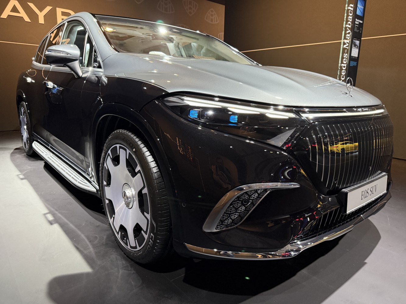 Front exterior with advanced headlights and distinctive wheel design