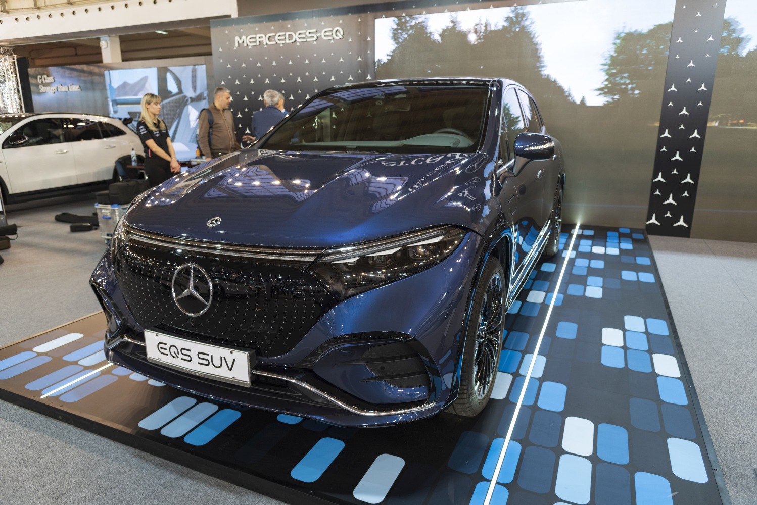 Front grille and sleek LED headlights of a modern electric SUV