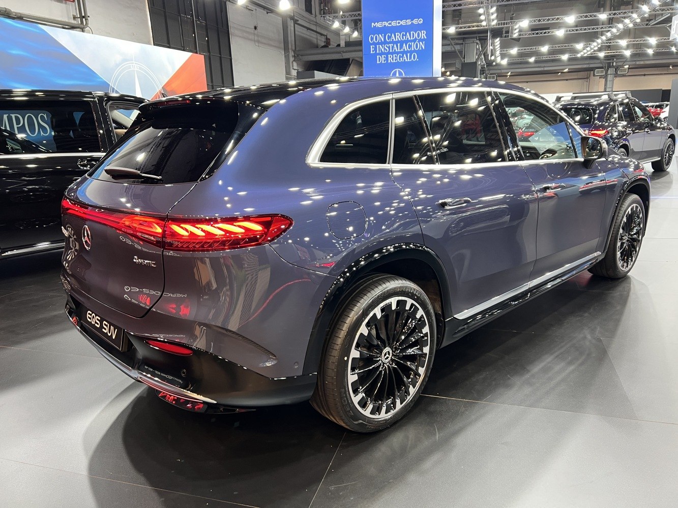 Rear side view of modern electric SUV with LED tail light and stylish rims