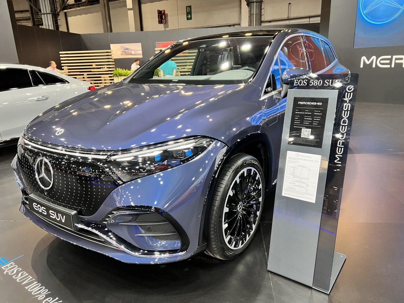 Front grille, LED headlights, and alloy wheel of a luxury electric SUV