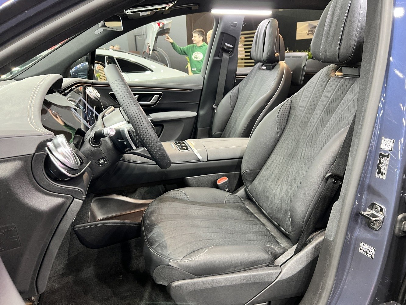 Luxury front interior with leather seats and advanced dashboard technology