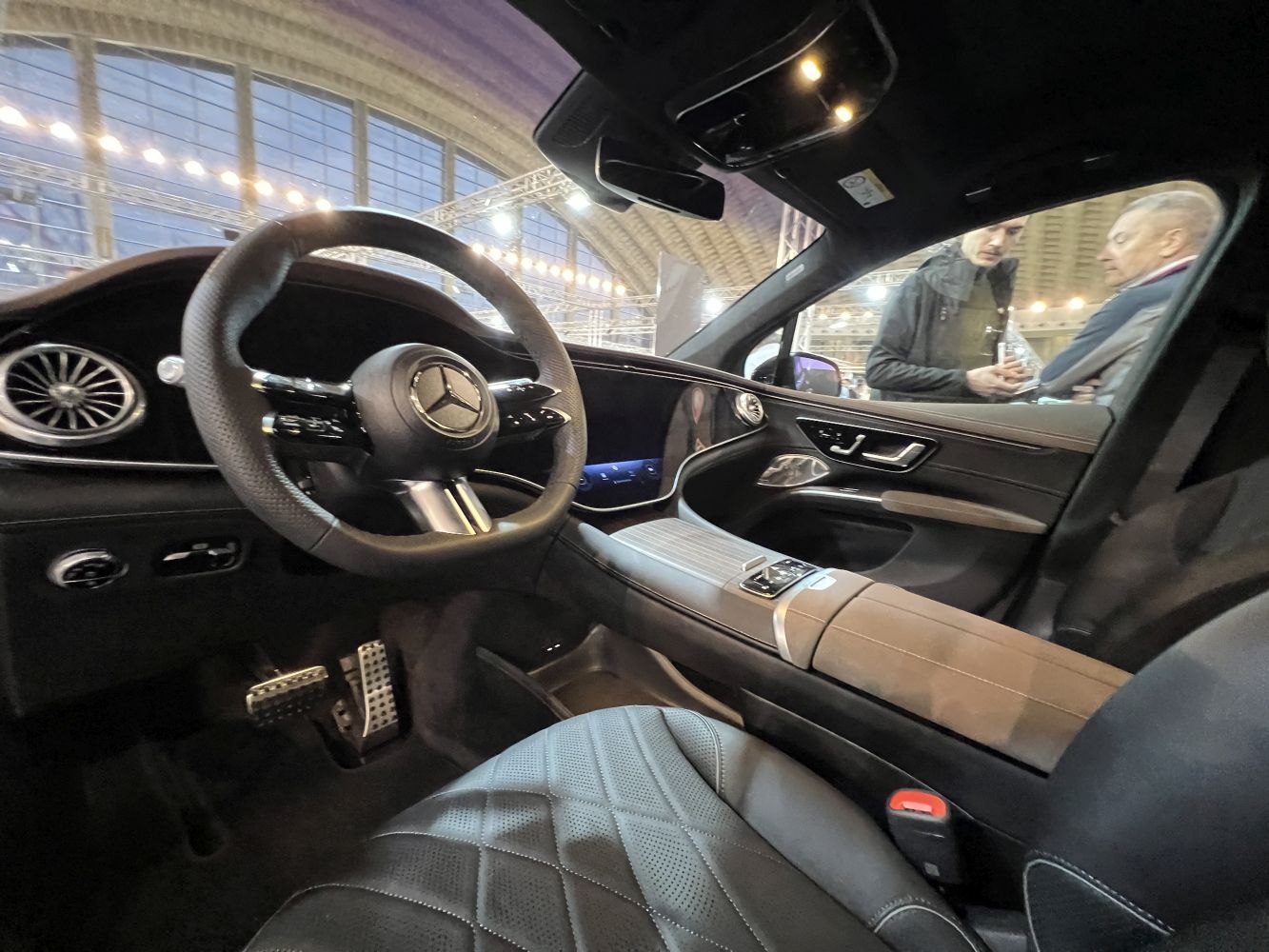 Luxury SUV interior with digital dashboard and steering wheel