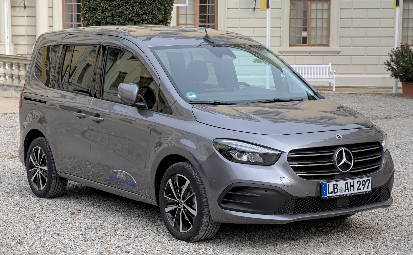 Front side view with modern grille and multi-spoke alloy wheels