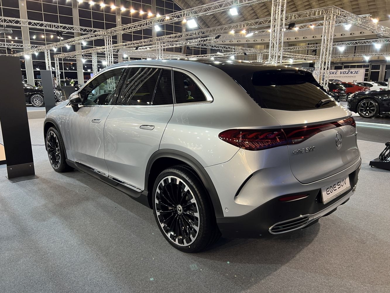 Rear side view of modern electric SUV with LED taillights and sleek design