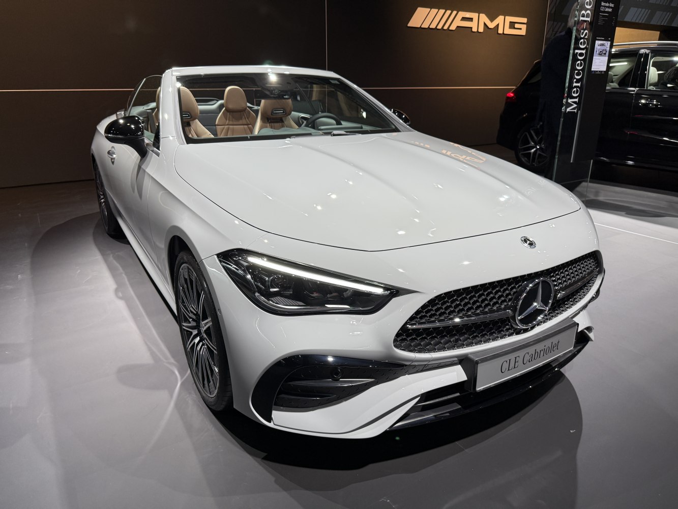 Convertible front view with LED headlights and sporty grille