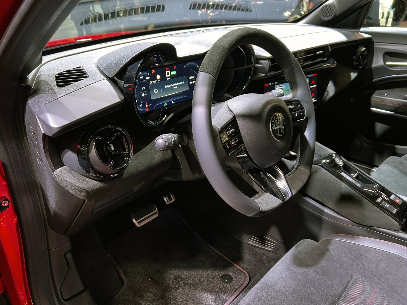 Digital dashboard and multifunction steering wheel in car interior