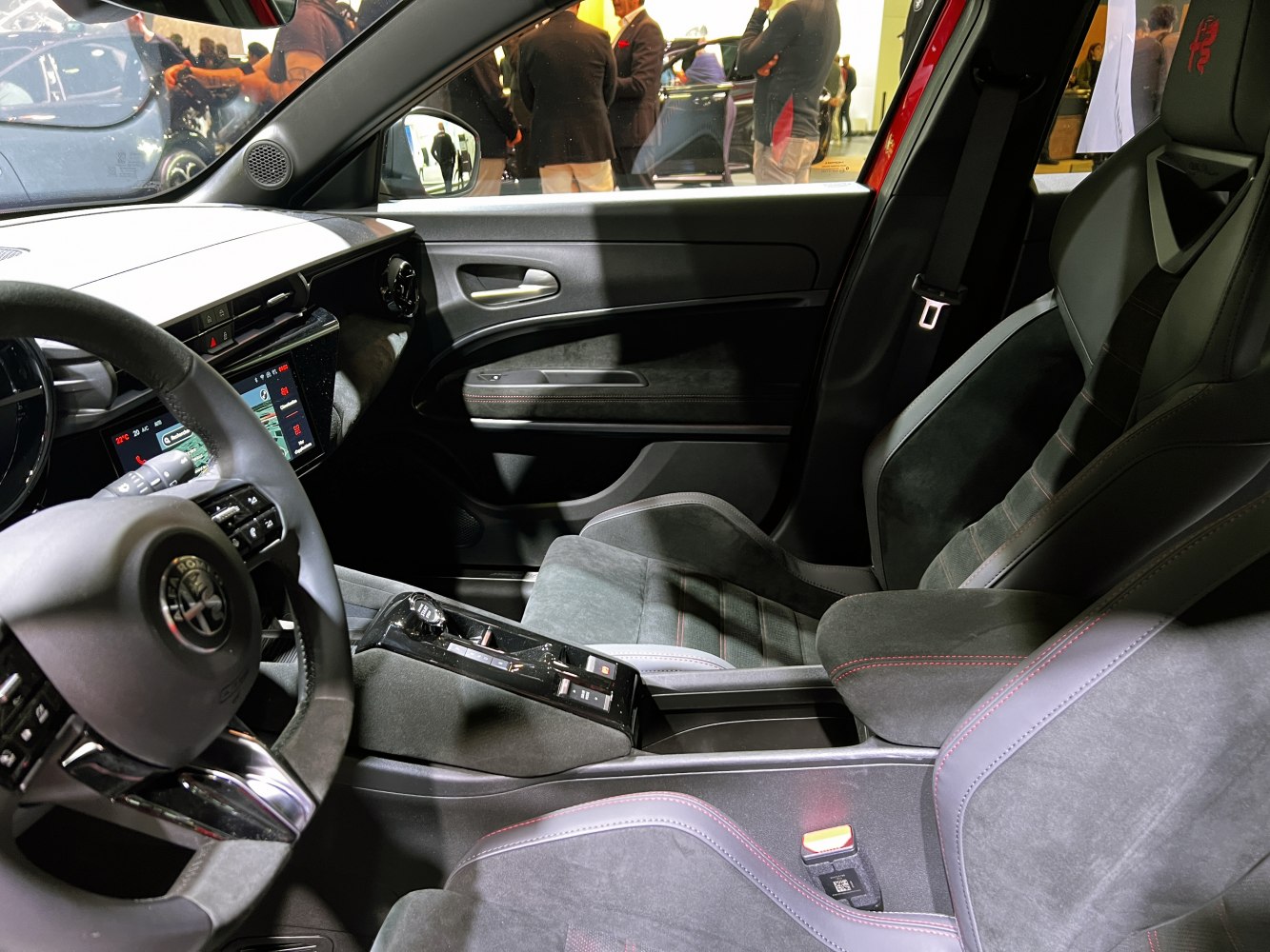 Sporty bucket seats and sleek dashboard with control panel