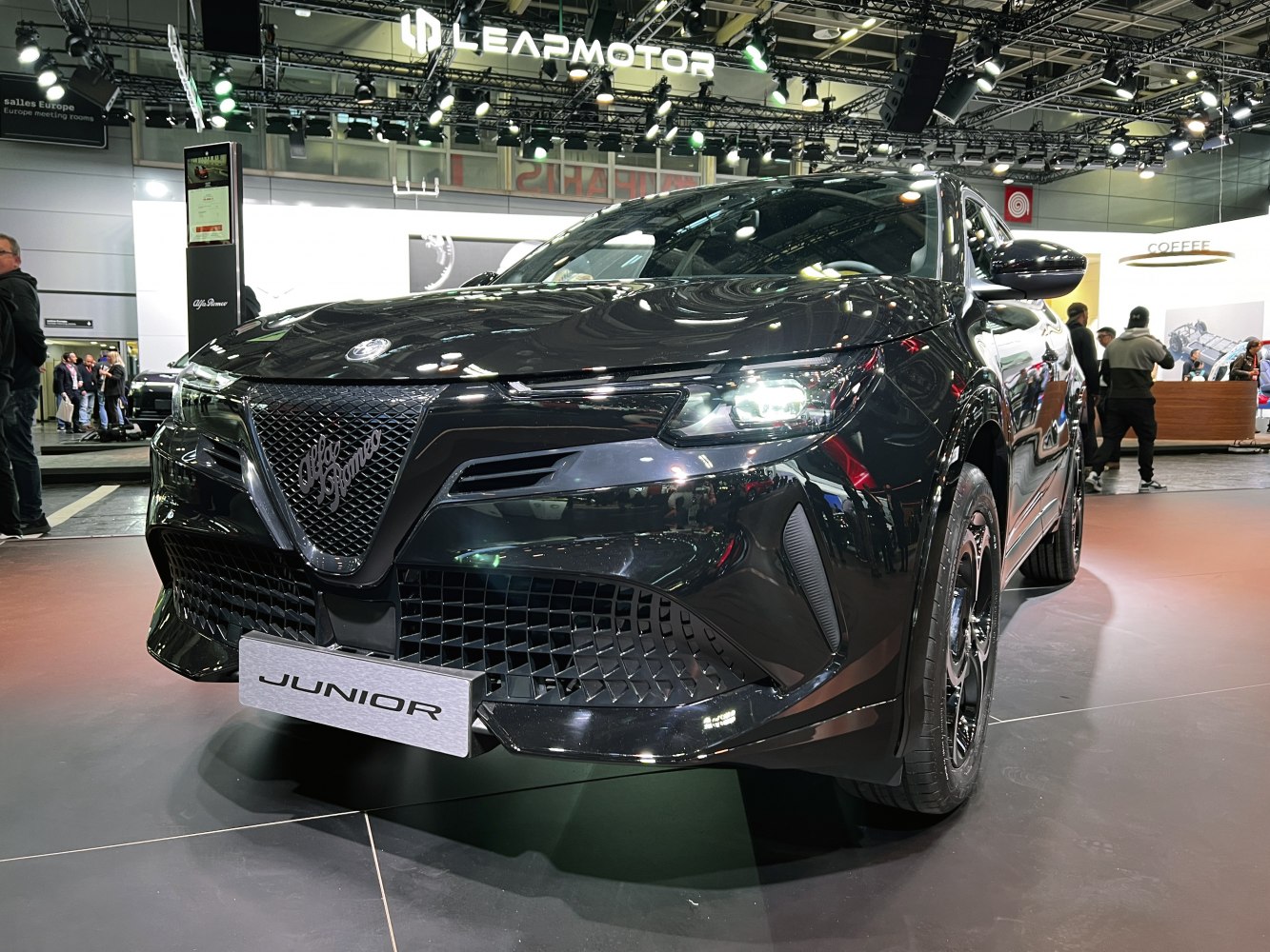 Front view with signature grille and illuminated LED headlights