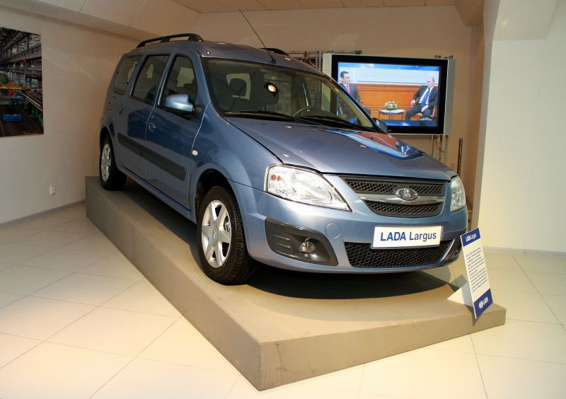 Blue station wagon with front-side view and roof rails