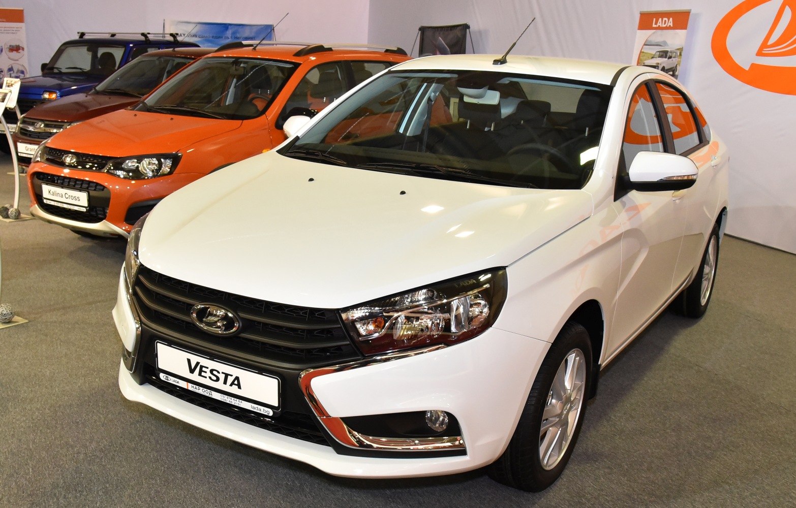 Front view with sleek headlights and black grille featuring chrome accents