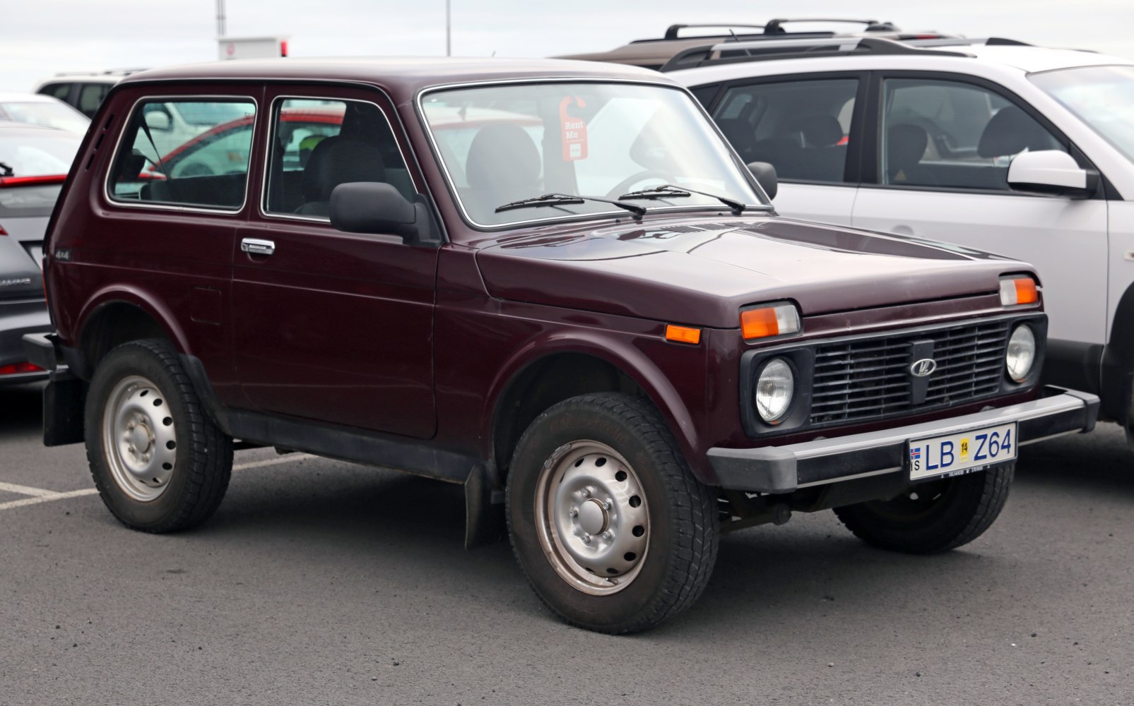 3-door compact SUV with boxy design and round headlights