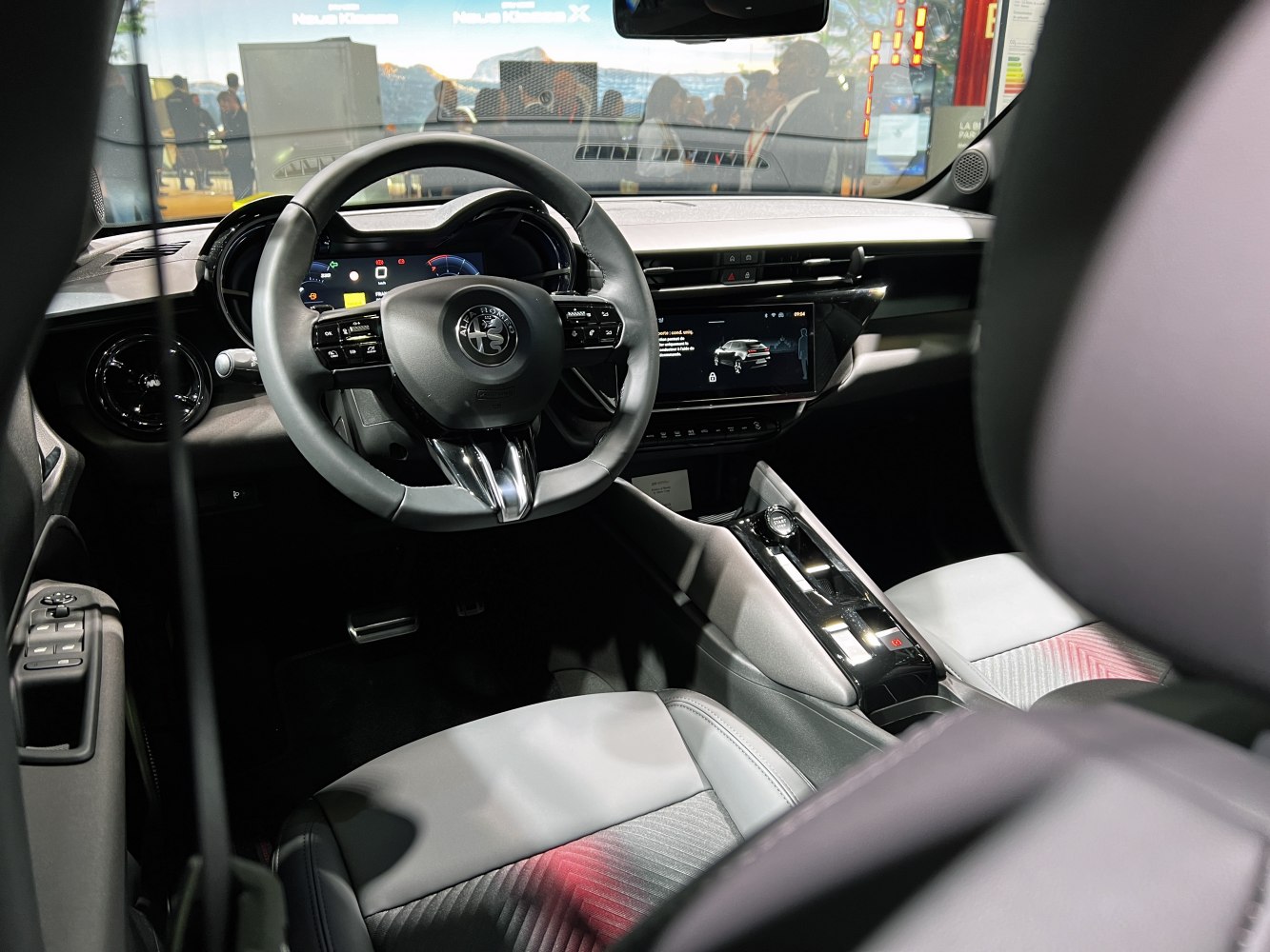 Steering wheel and digital dashboard in a modern car interior